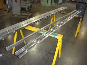 Lengths of Zouri Storefront  moldings in aluminum